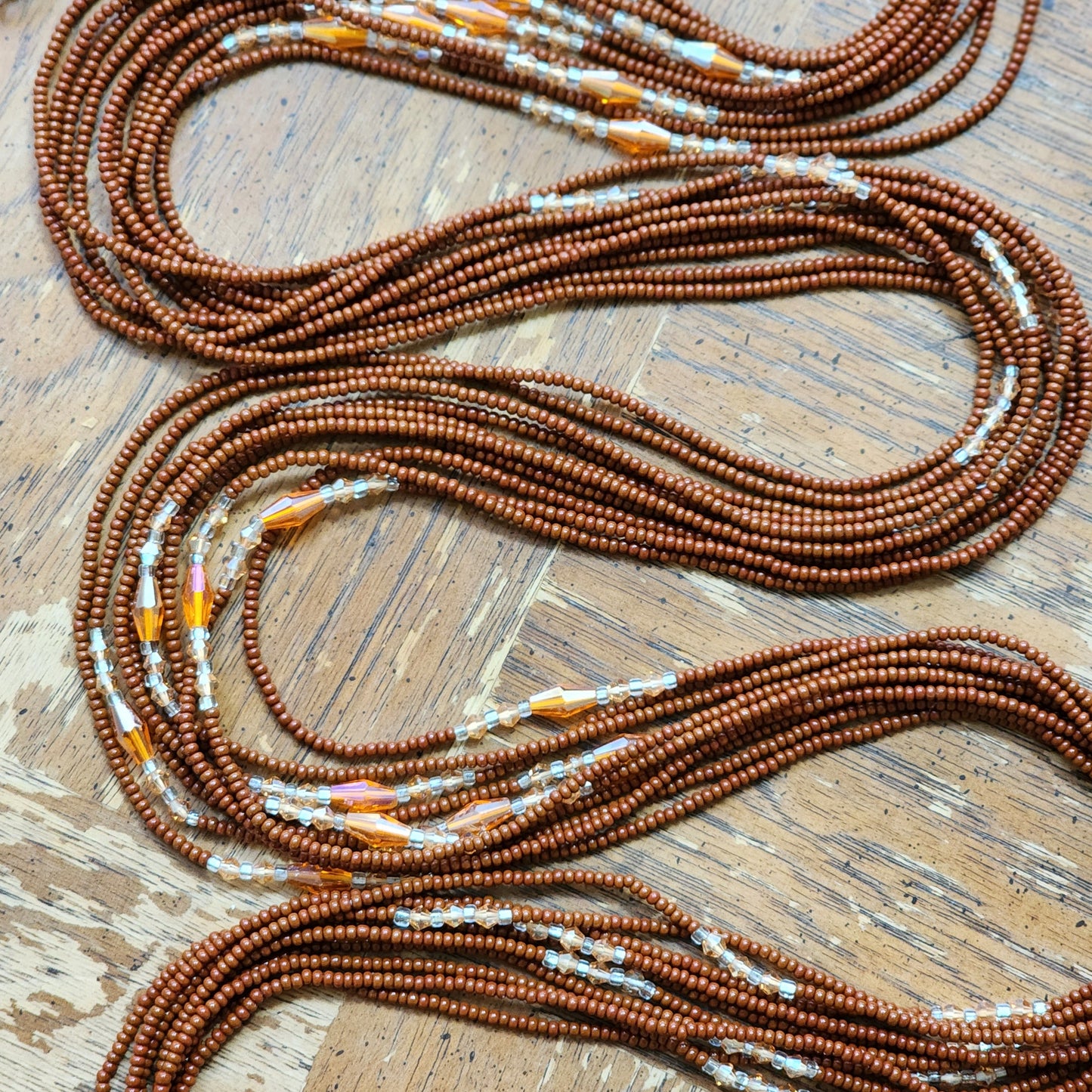 Brown Premium handmade waistbeads with orange iridescent crystals